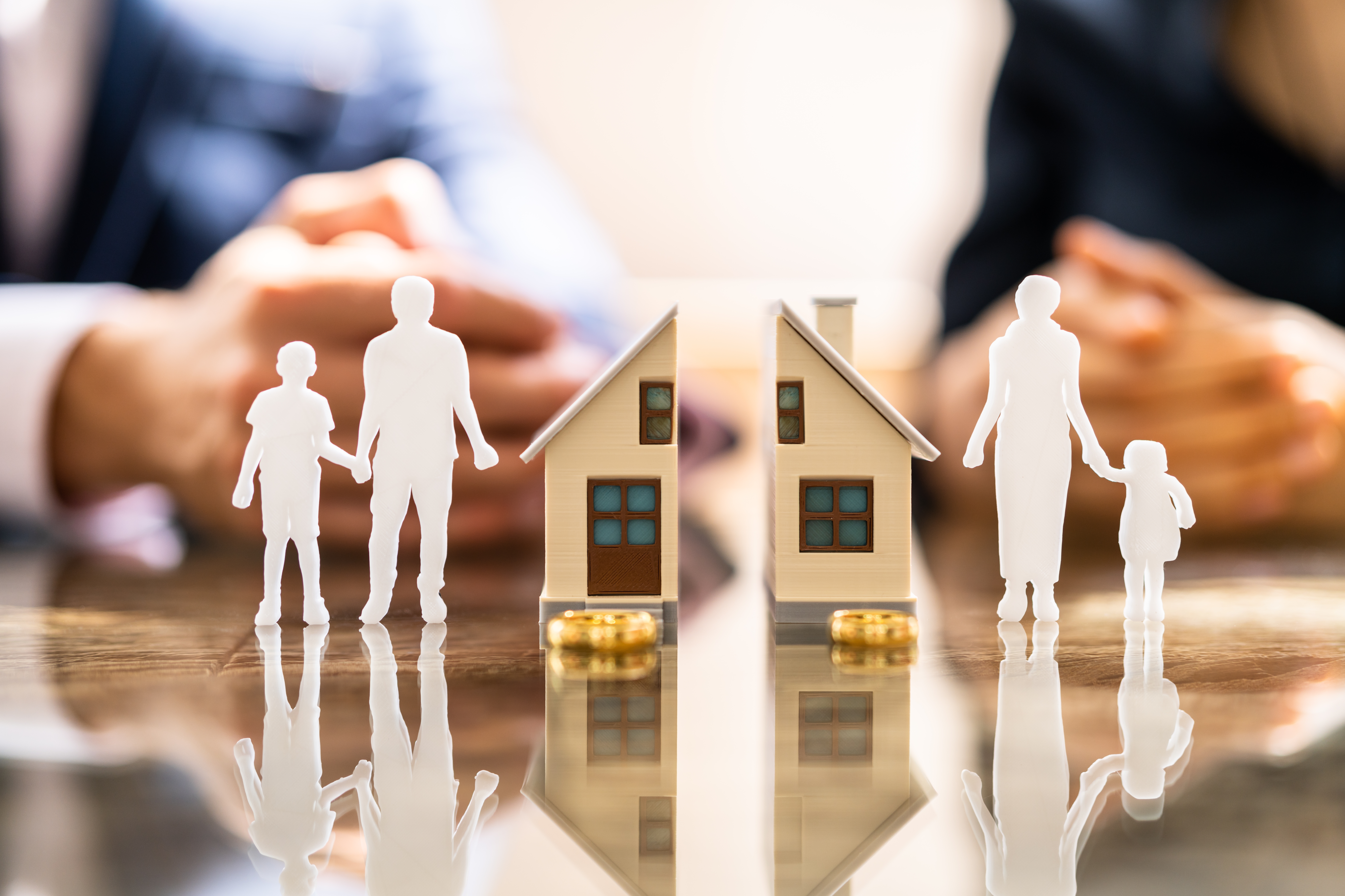 Wife And Husband Splitting Children And House During Divorce